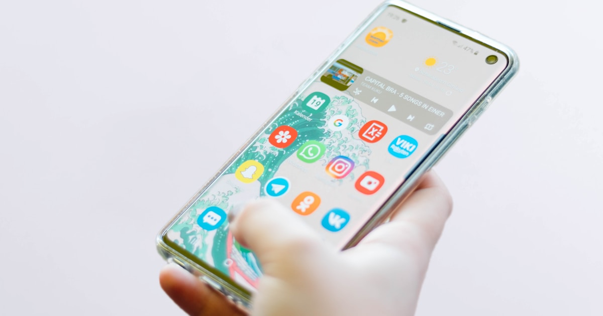 Multiple devices showing progressive web app interfaces on smartphones and tablets